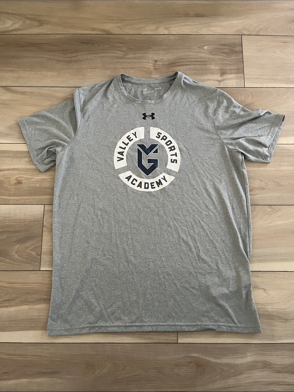 Under Armour Men’s Gray Valley Sports Academy Short Sleeve Logo Tee